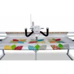 Used Janome Quilt Maker 18 longarm quilting machine, pre-owned and serviced